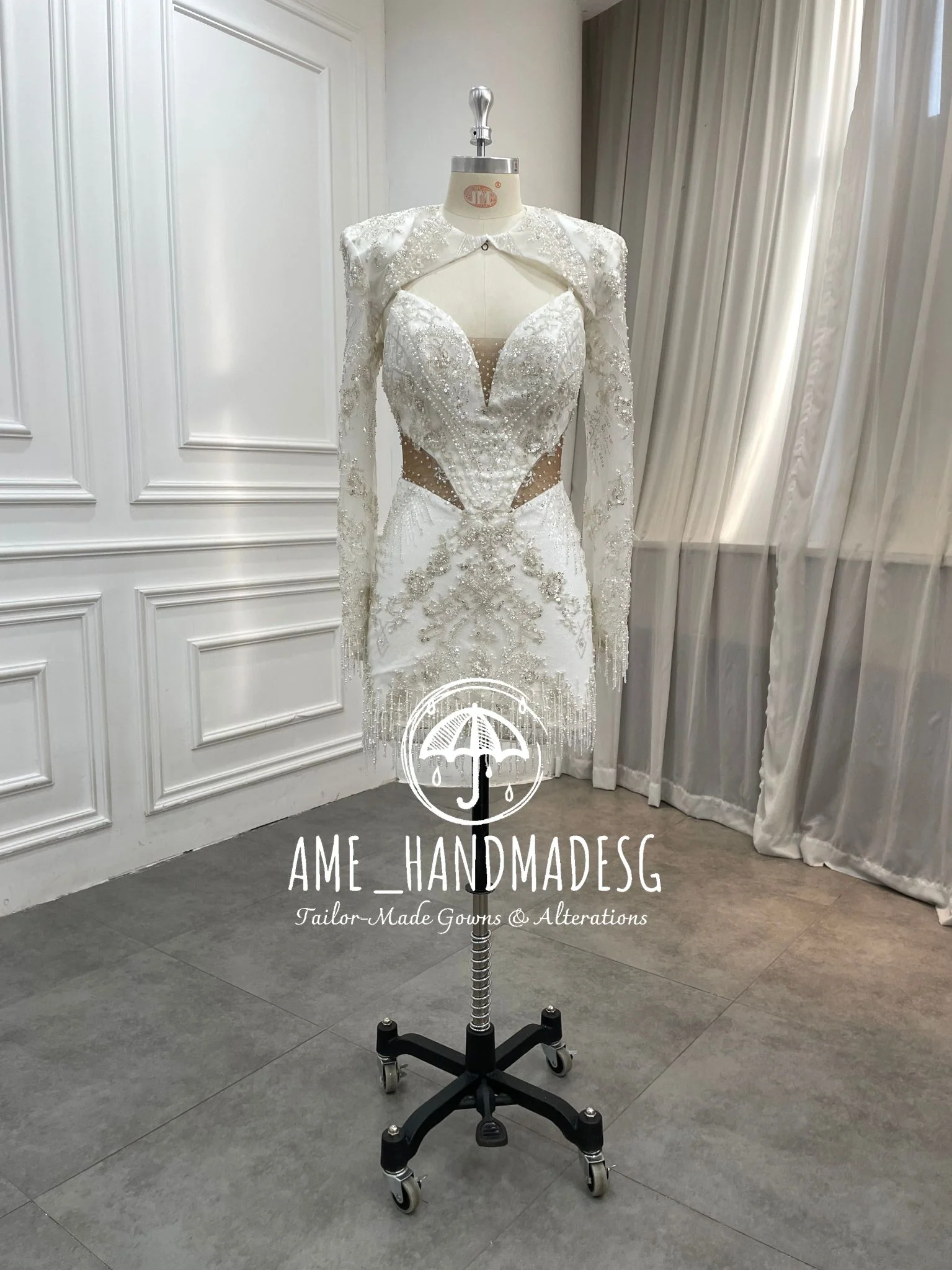 Luna Royale: A Beaded Bridal Mini with Regal Sleeves