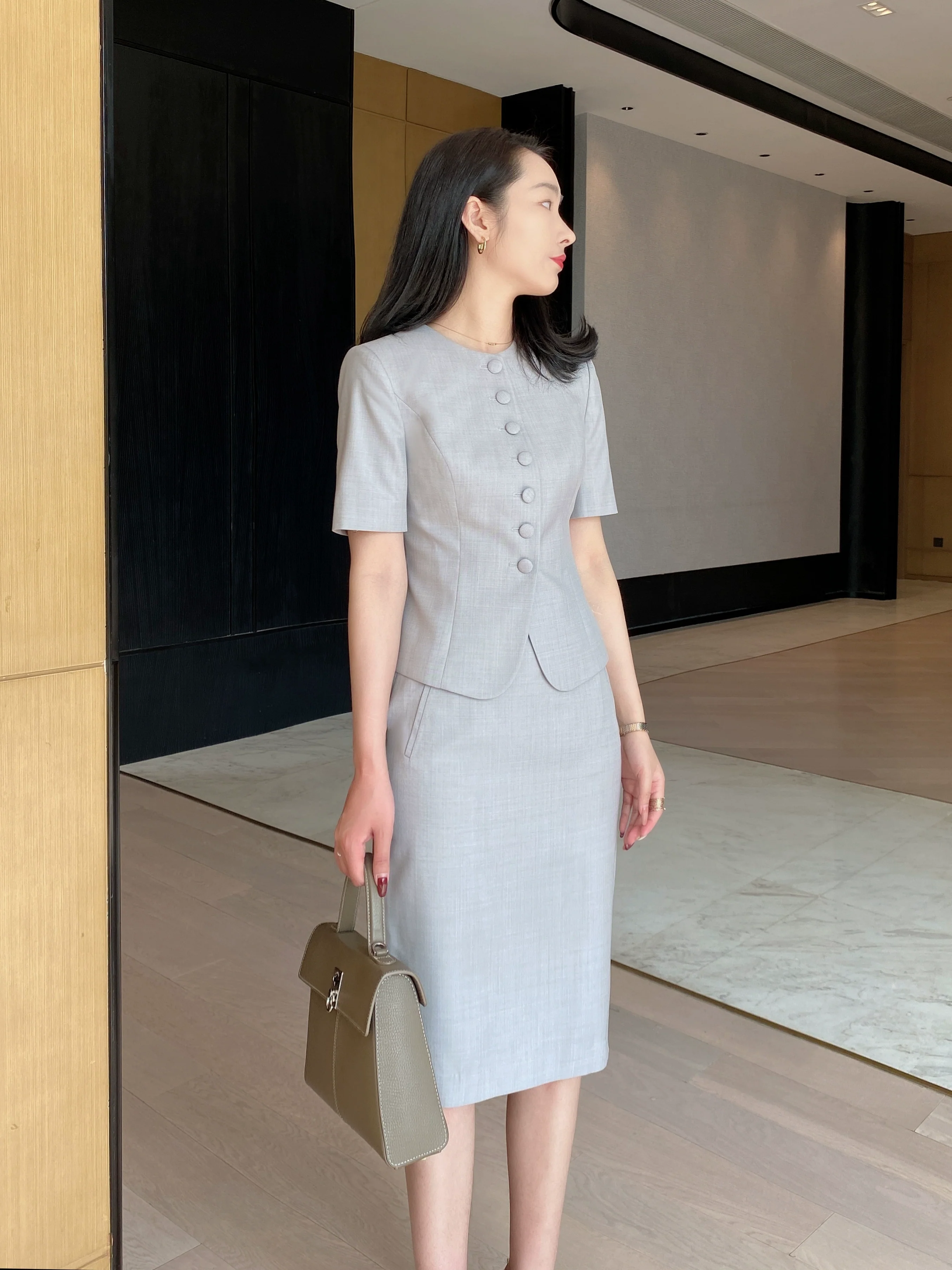 Elegant Light‑Luxury Short‑Sleeve Suit Set with Hip‑Accented Skirt - Image 3
