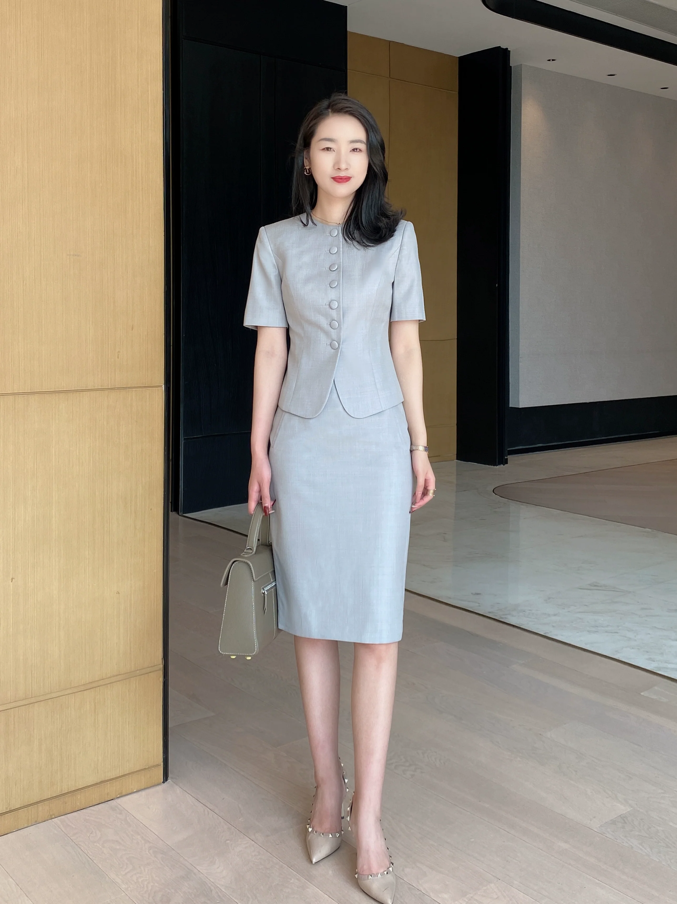Elegant Light‑Luxury Short‑Sleeve Suit Set with Hip‑Accented Skirt - Image 6