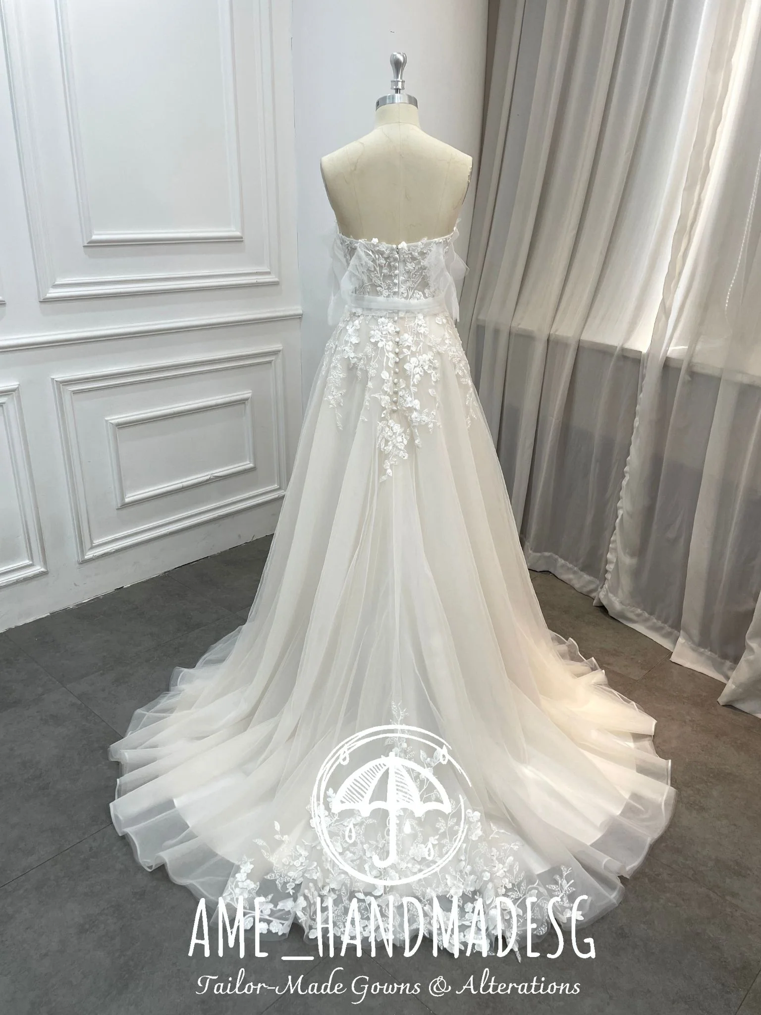 Ethereal Whisper: A Strapless Tulle Bridal Gown with Floral Lace - Image 2
