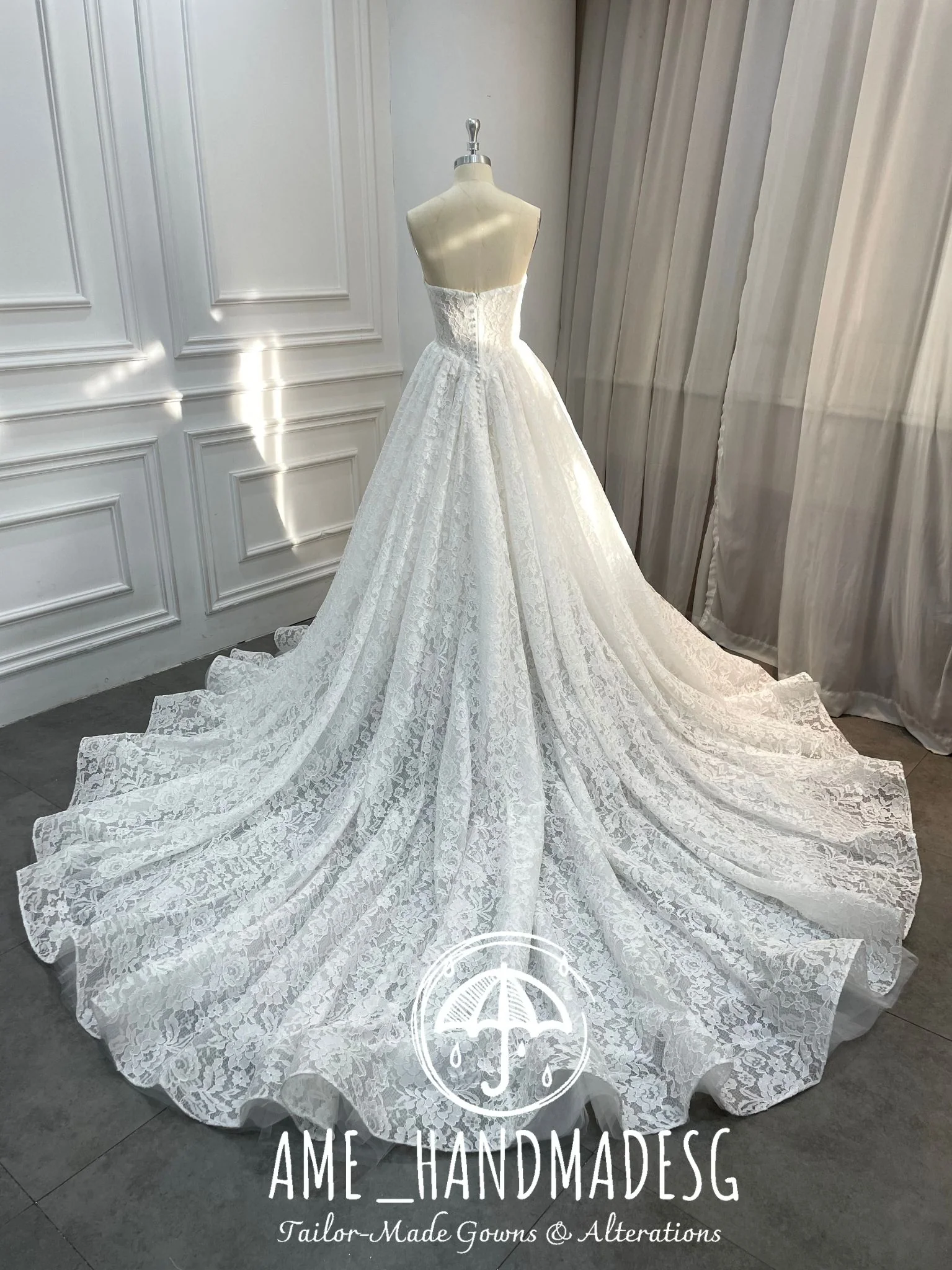 Lace Reverie: A Timeless Strapless Ball Gown in Pure Romance - Image 2