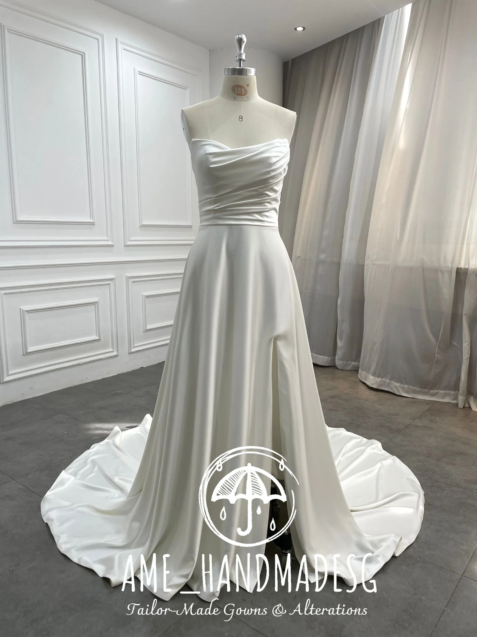Timeless Serenity: A Classic Satin A-Line Wedding Gown with Elegant Train