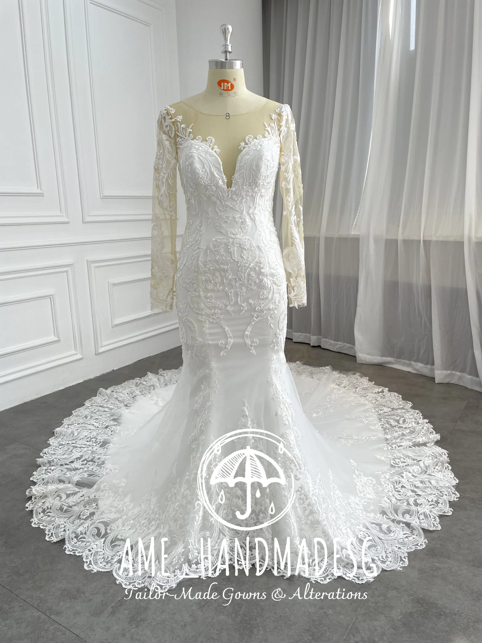 Elegant Long-Sleeve Lace Mermaid Wedding Gown with Illusion Neckline & Chapel Train - Image 2
